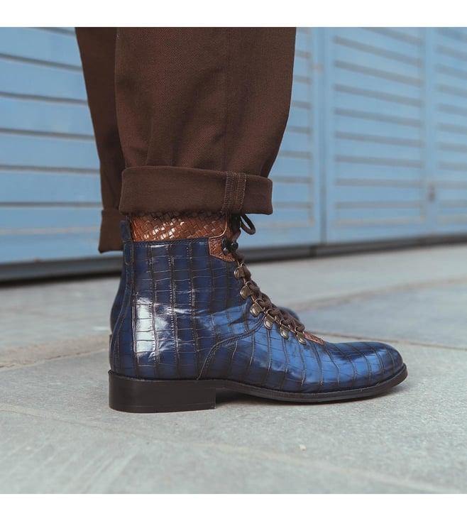 the alternate navy blue croco boots with weaving detail