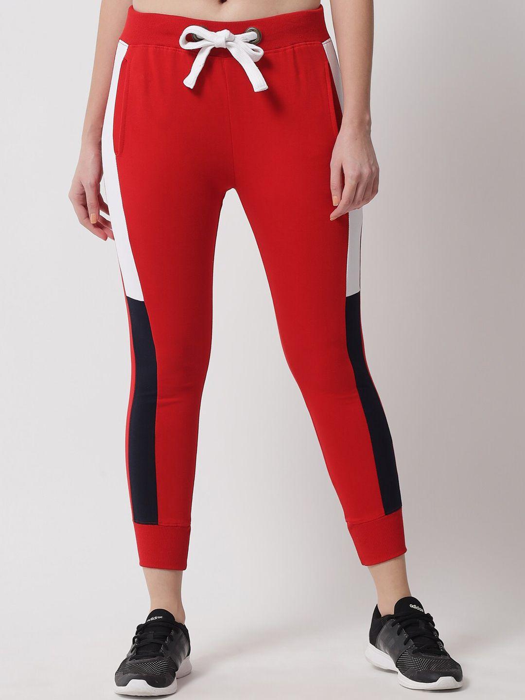 the dry state  women red mid-rise joggers with side stripes