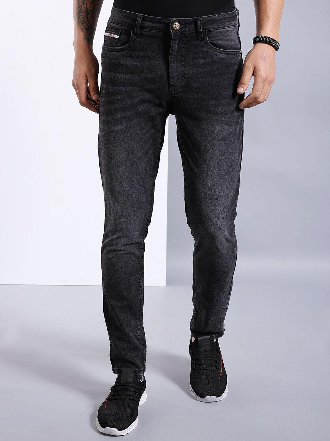 the indian garage co men black mid-rise slim fit clean look light fade stretchable jeans