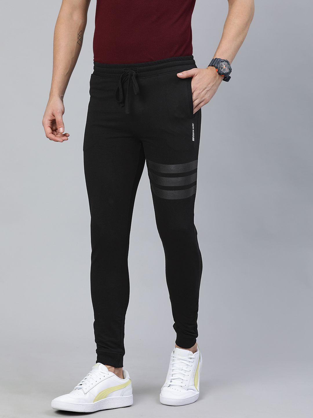 the indian garage co men black solid regular fit joggers with stripe detail