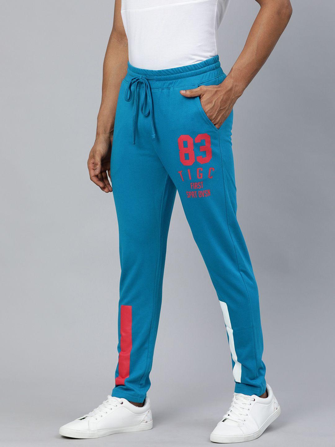 the indian garage co men blue solid regular fit track pants