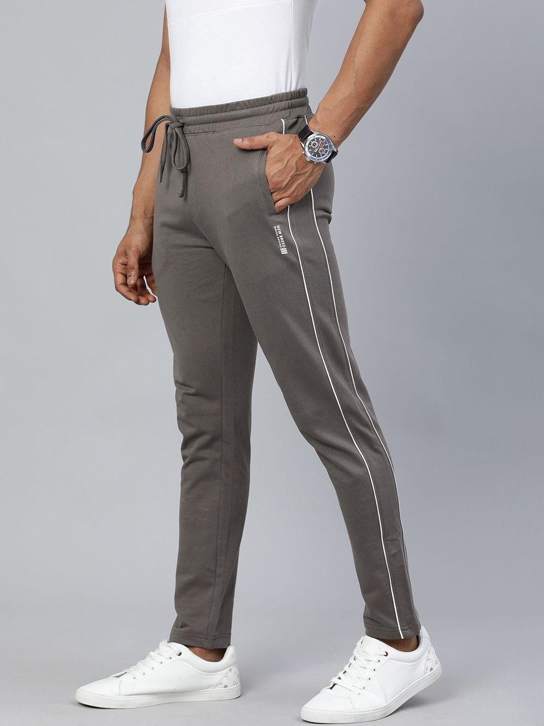 the indian garage co men charcoal grey solid regular fit track pants with side stripe