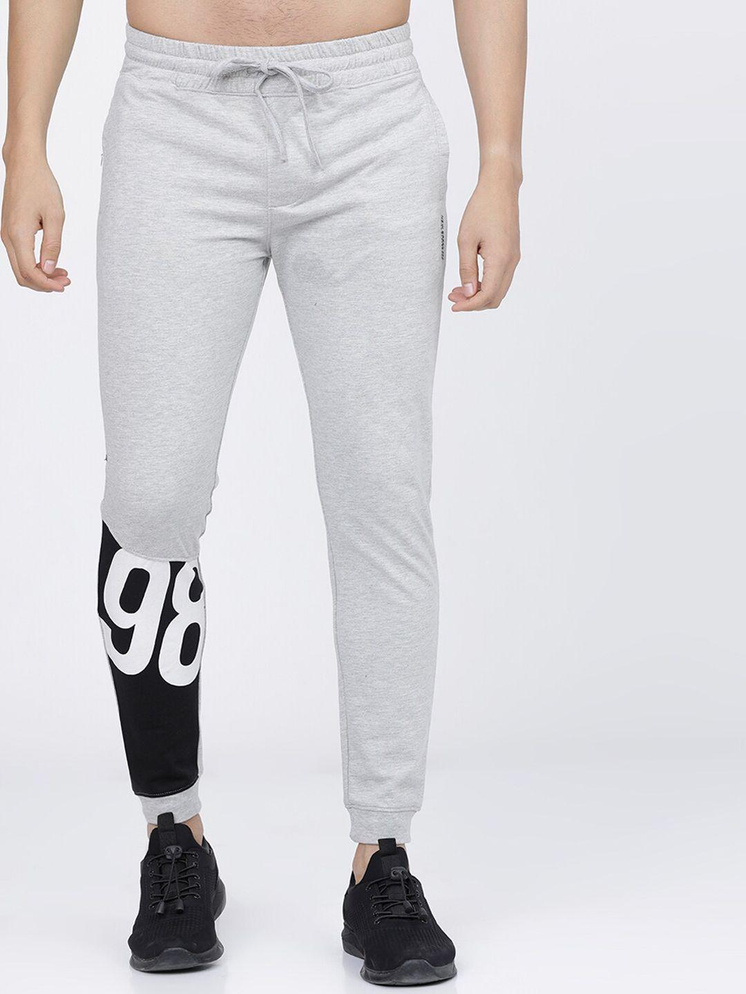 the indian garage co men grey melange & black printed slim-fit joggers