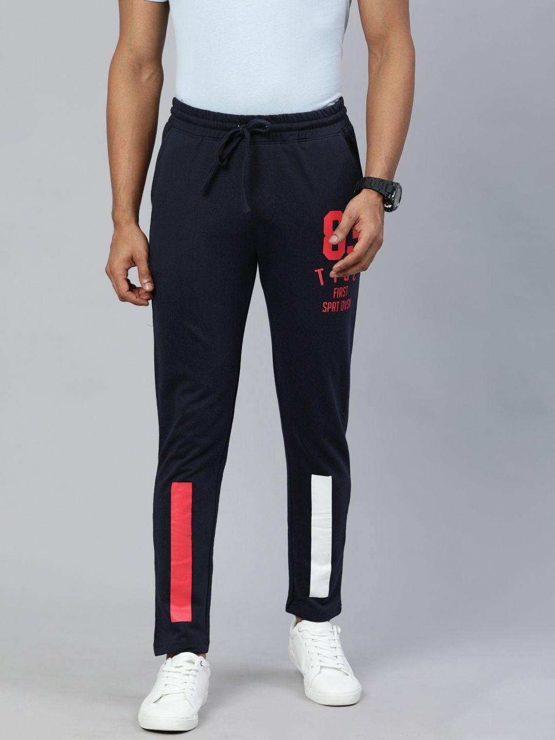 the indian garage co men navy blue solid regular fit track pants with printed details