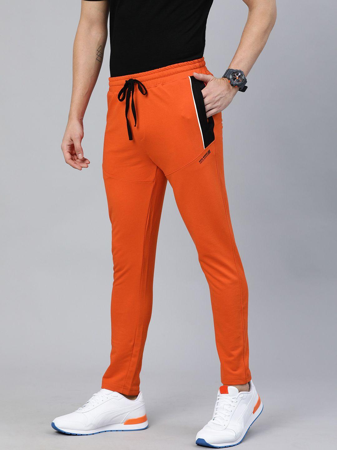 the indian garage co men rust orange solid regular fit track pants