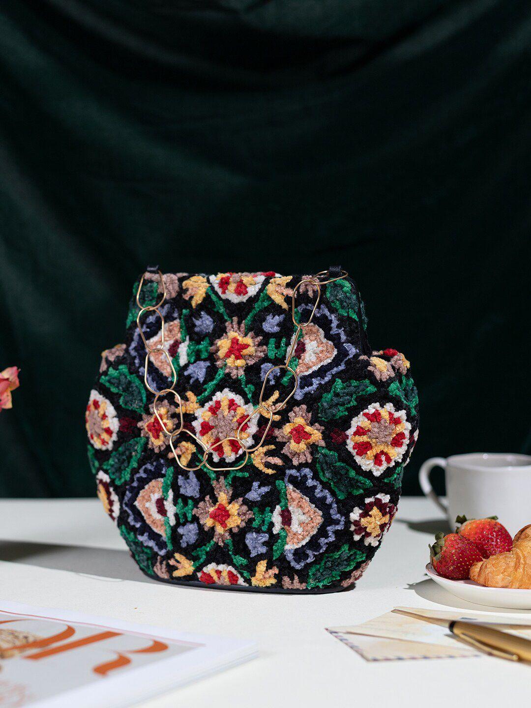 the leather garden embroidered velvet potli bag