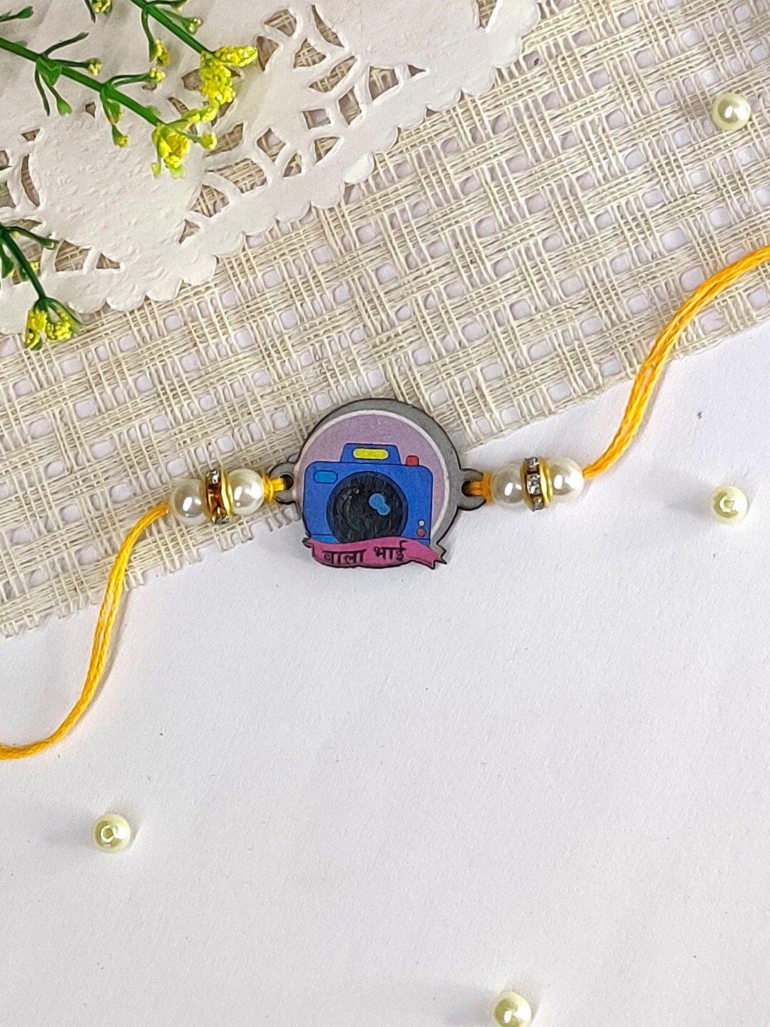 the magic wand kids camera charm thread rakhi