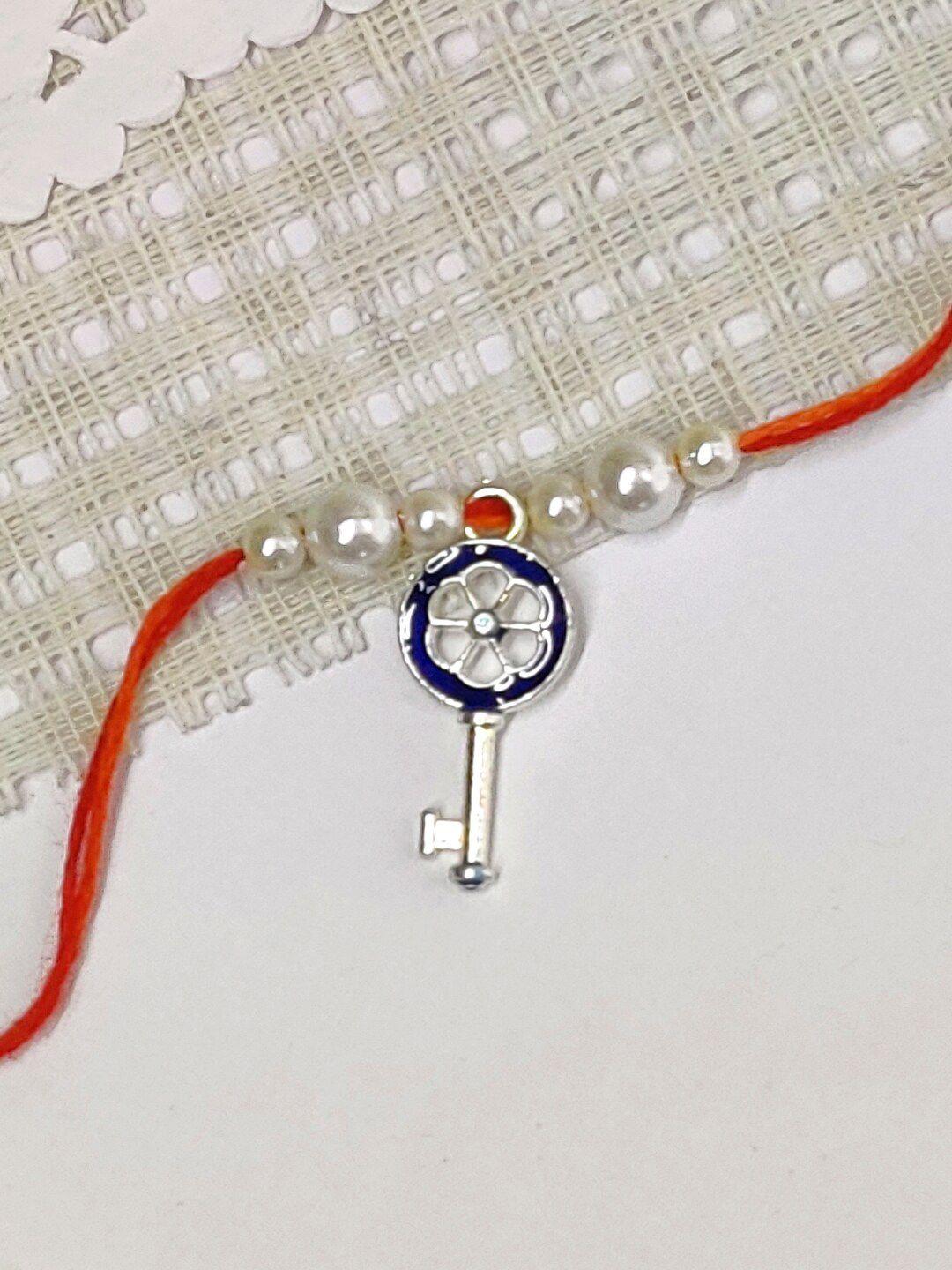 the magic wand pearl beaded key charm rakhi