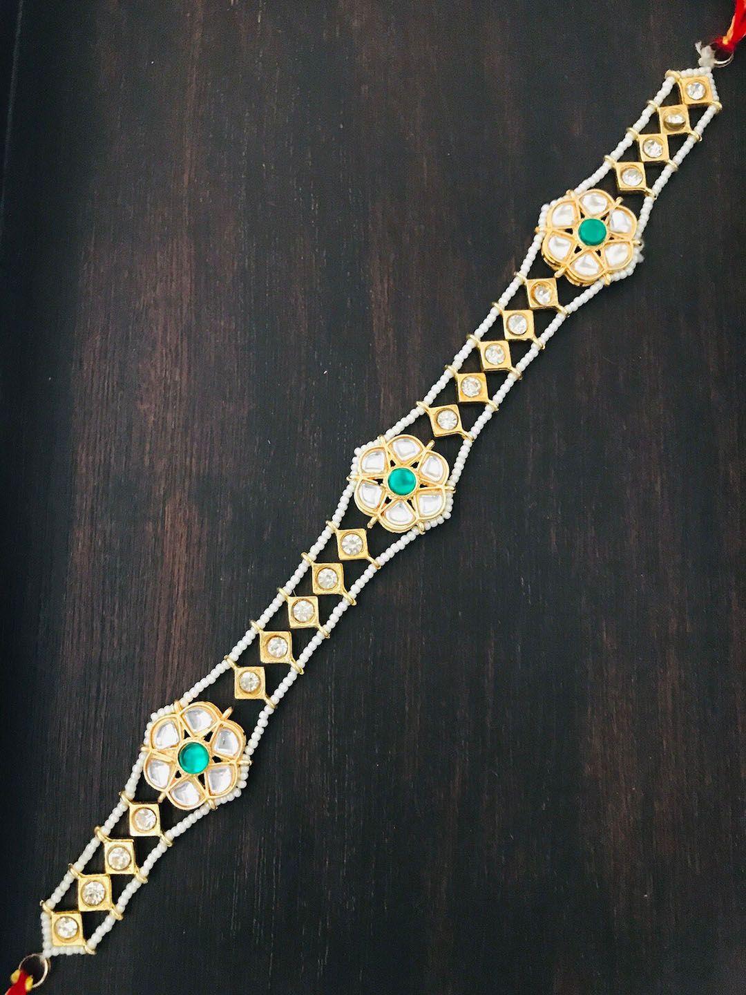 the opal factory  gold-plated kundan studded mathapati head jewellery