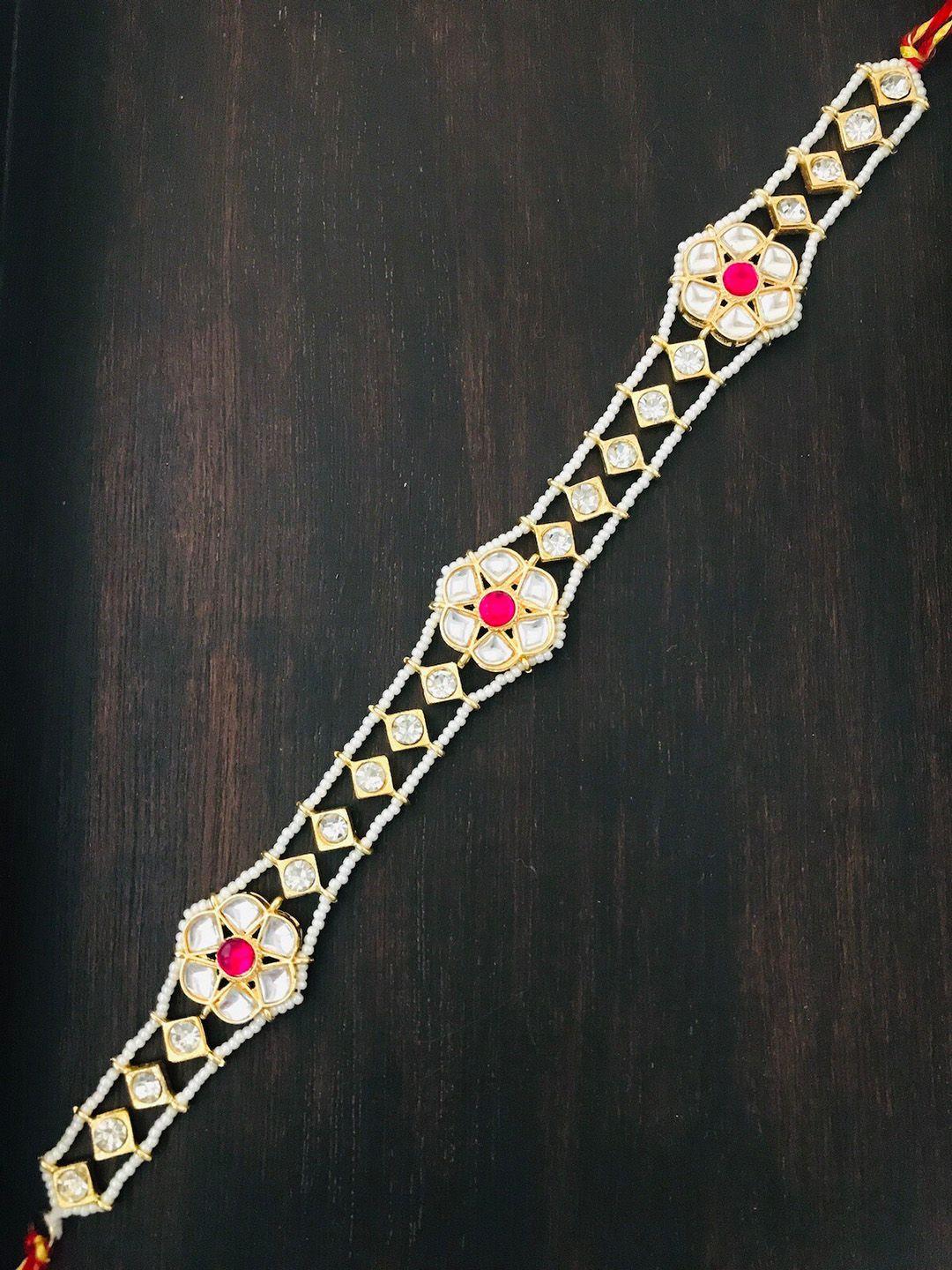 the opal factory gold plated & red studded floral mathapatti