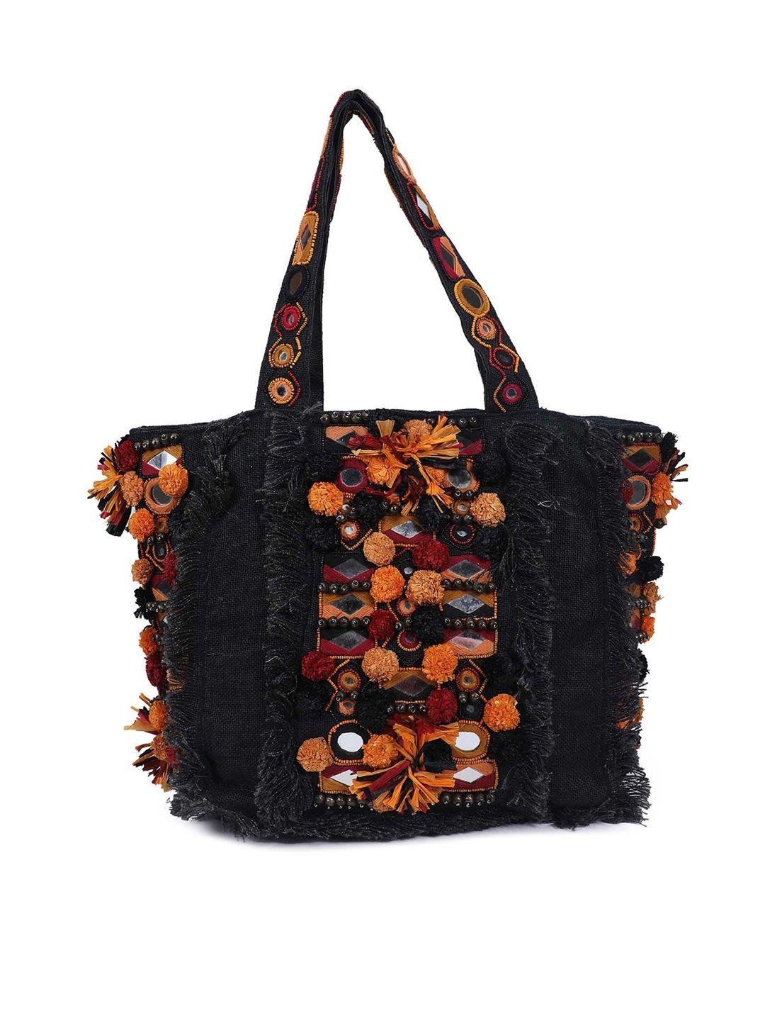 the purple sack black floral structured tote bag with tasselled