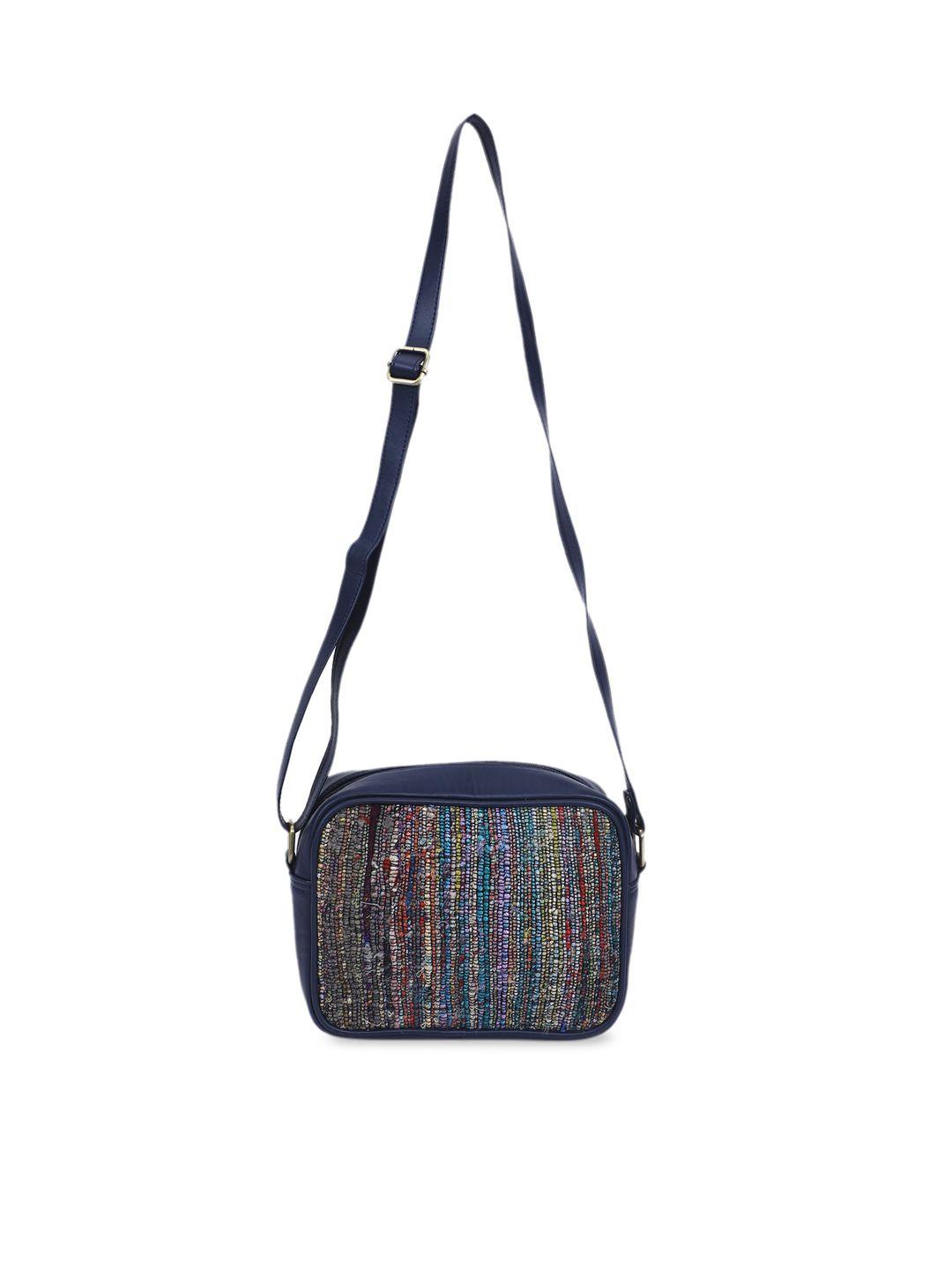 the purple sack blue ethnic motifs printed structured sling bag with cut work