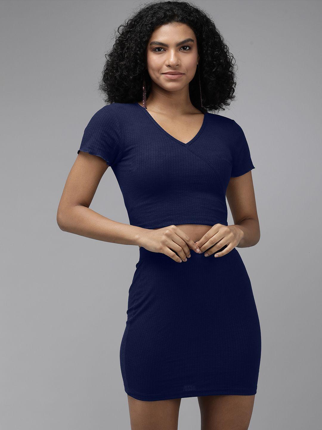 the roadster lifestyle co blue ribbed cropped top with skirt