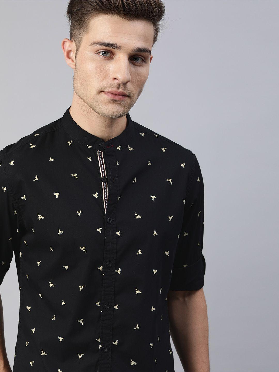 the roadster lifestyle co men black & beige regular fit conversational printed casual shirt