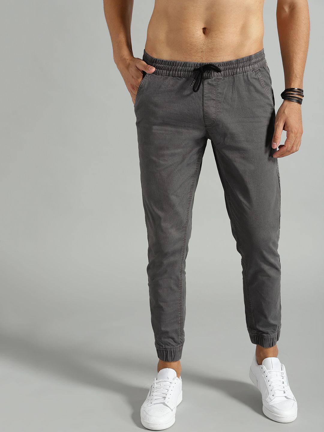 the roadster lifestyle co men charcoal grey slim fit solid joggers