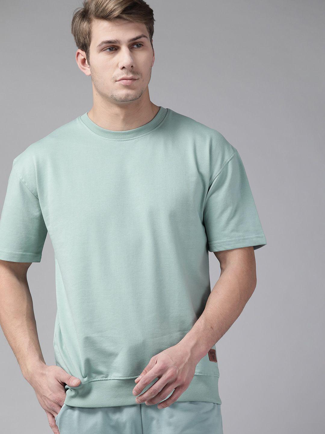 the roadster lifestyle co men green solid relaxed fit sweatshirt