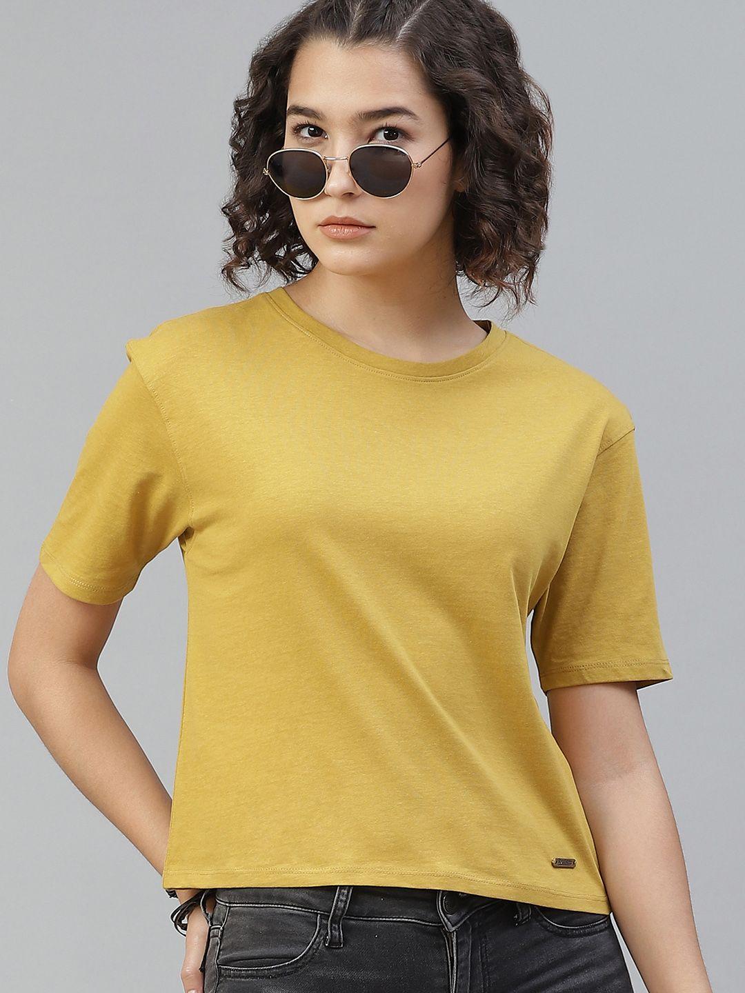 the roadster lifestyle co women mustard yellow pure cotton solid round neck t-shirt