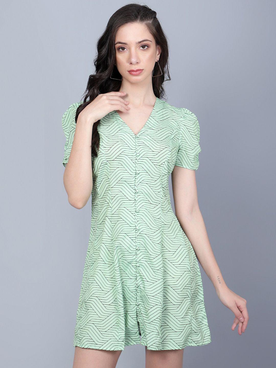 the roadster lifestyle co. green geometric printed v-neck smocked a-line mini dress