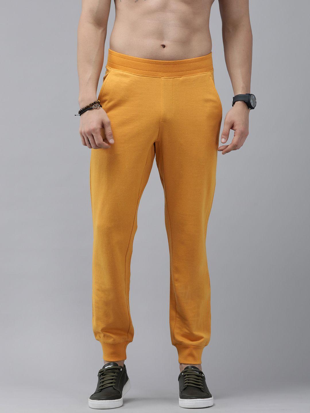 the roadster lifestyle co. men mustard yellow solid joggers