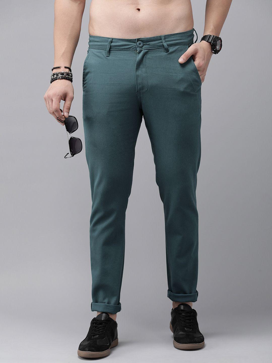 the roadster lifestyle co. men solid mid-rise regular fit trousers