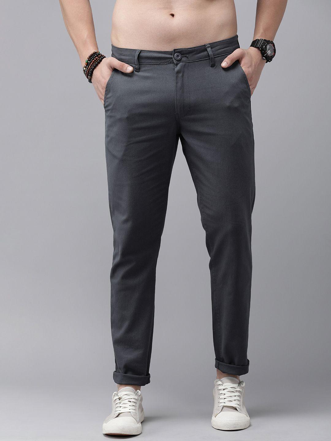 the roadster lifestyle co. men solid mid-rise regular fit trousers