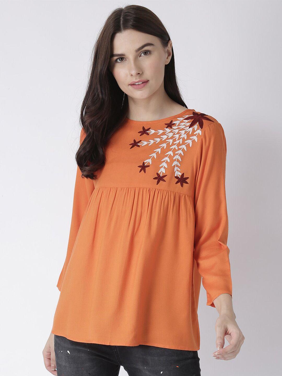 the vanca orange floral embroidered top