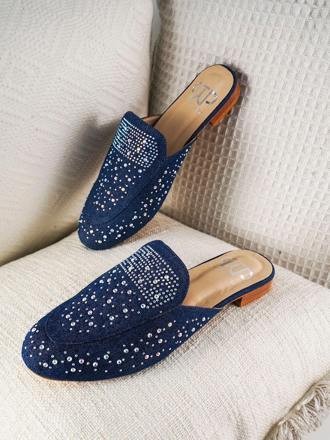 the white pole embellished fabric mules