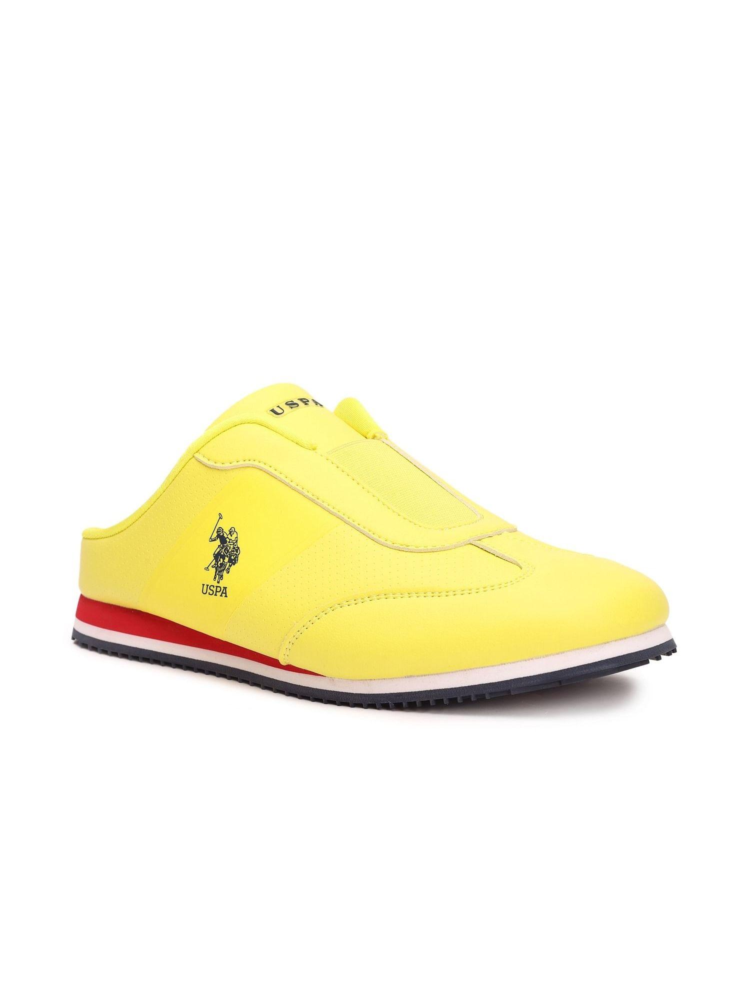 theon mens solid yellow slip on sneaker