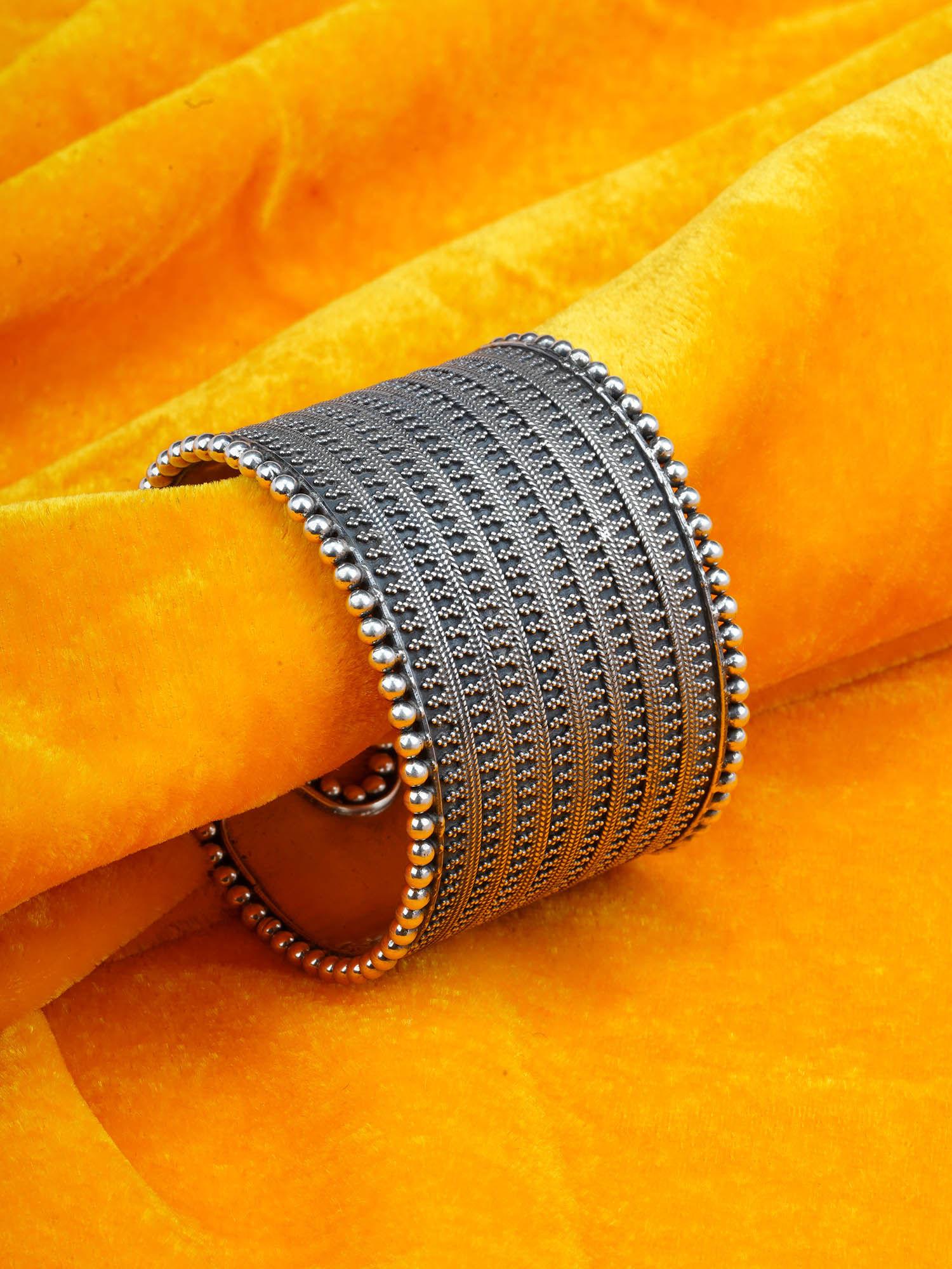 this cuff statement bangle is handcrafted in oxidized silver with beautiful beads