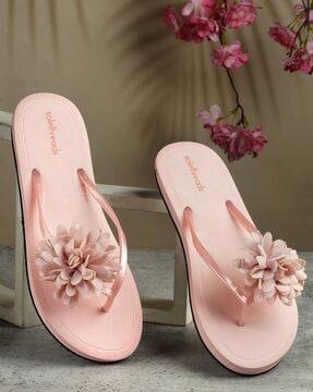 thong flip-flops with floral applique