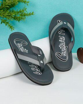 thong-strap flip flops with logo print