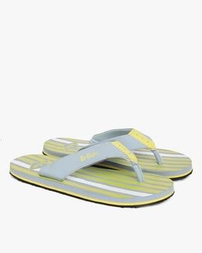 thong-strap flip-flops with striped footbed