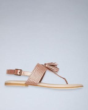 thong-strap flat sandals with buckle closure