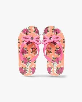 thong-strap flip-flops with bow accent