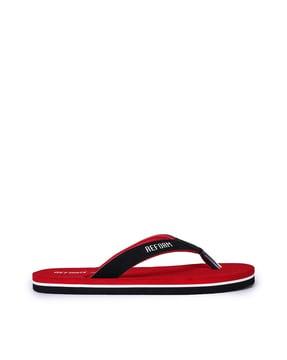 thong-strap flip flops with signature branding