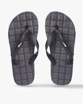 thong-strap flip-flops with textured footbed