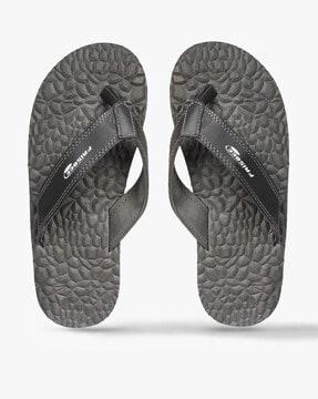 thong-strap flip-flops with textured footbed