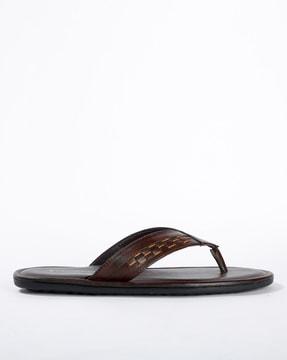 thong-strap sandals with stitch accent