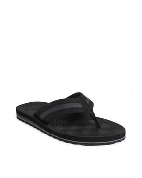 thong-strap sandals with textured footbed
