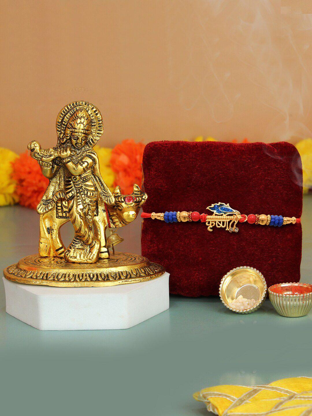 tied ribbons krishna rakhi with lord krishna idol