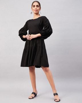 tiered dress with cuffed sleeves