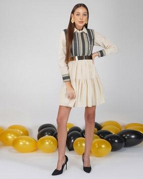 tiered dress with cuffed sleeves