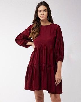 tiered dress with puff sleeves