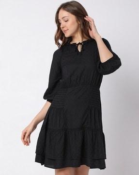 tiered dress with puff sleeves