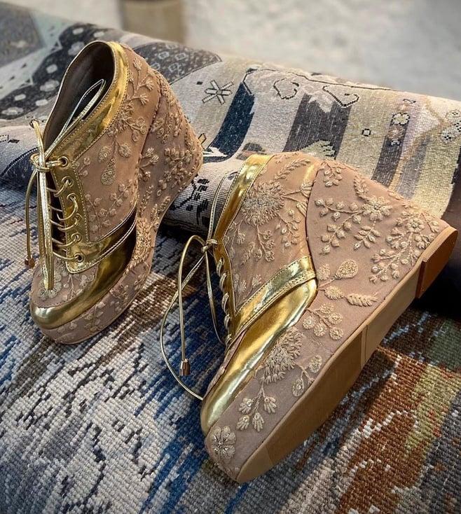 tiesta gold wedge sneakers