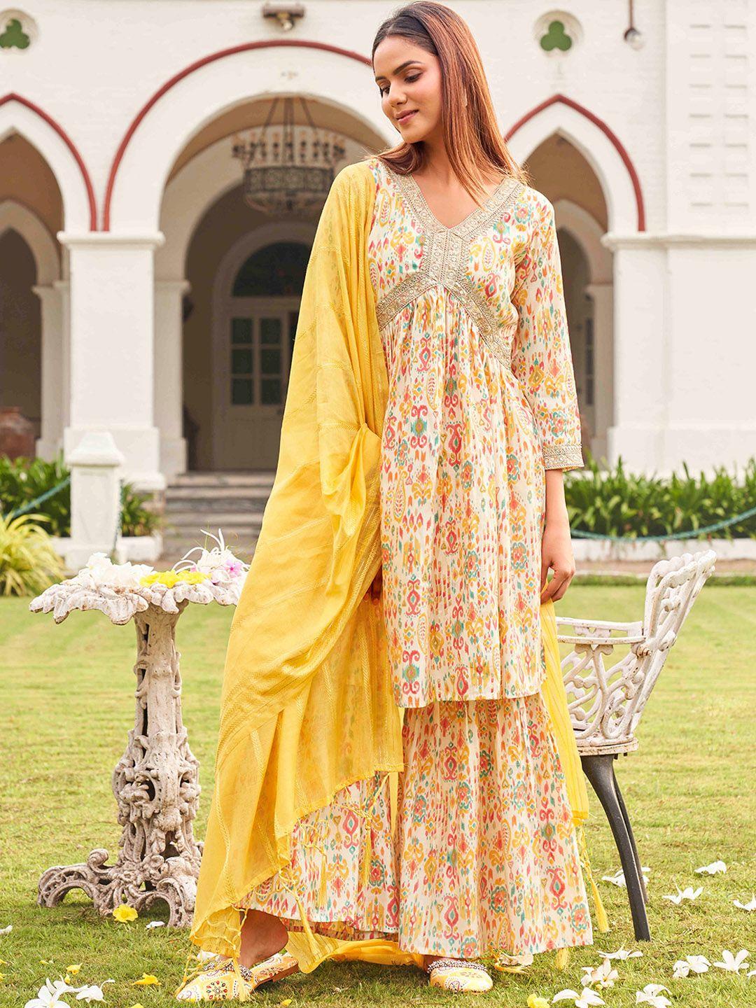 tikhi imli women yellow printed pleated kurta with sharara & with dupatta