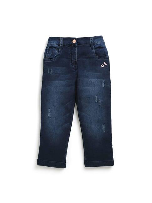 tiny girl blue distressed jeans