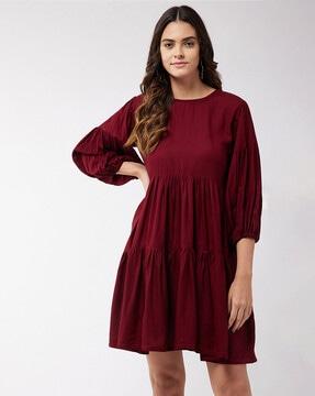 tired dress with puff sleeves