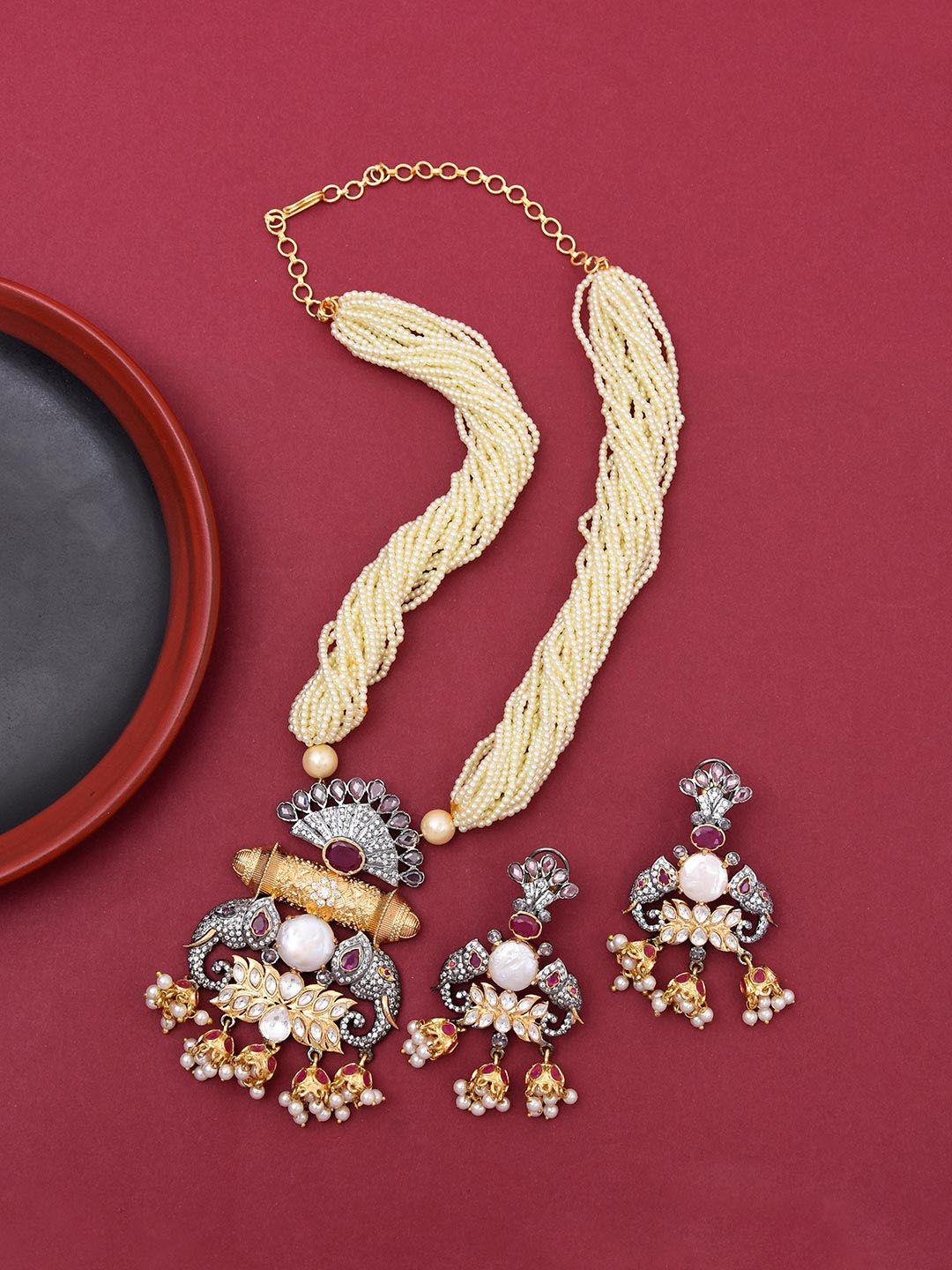 tistabene gold-plated red artificial stoned studded & beaded jewellery set