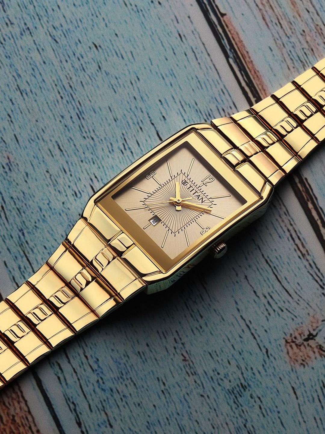 titan men yellow dial & gold toned stainless steel bracelet style straps analogue watch 9151ym07